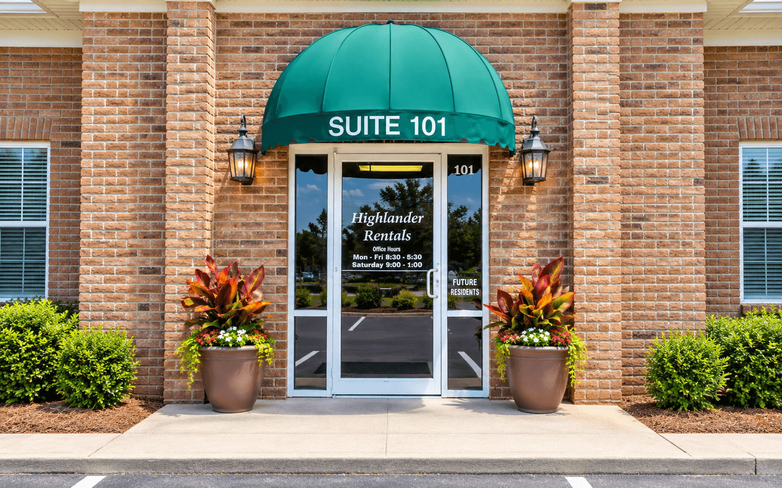 The front of a building with a green awning and a sign that says 